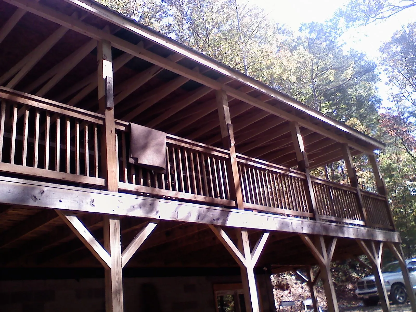 Timber framing under a new elevated porch and deck — Roof Leak Repair in Norwood by Roofing Brothers
